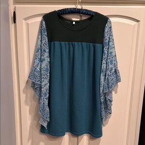 Teal and Green Women's Top with Floral Sleeves